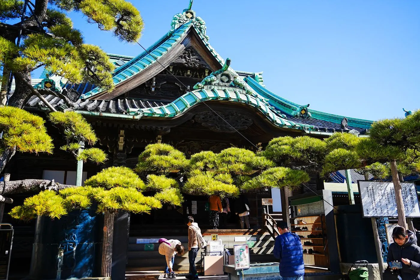 The main hall of Taishakuten among pine trees