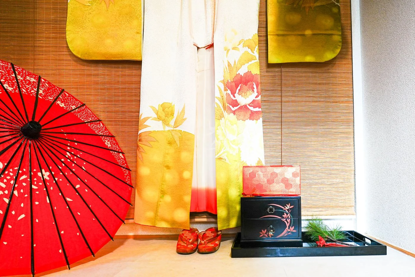 The photo space with kimono and a red Japanese umbrella