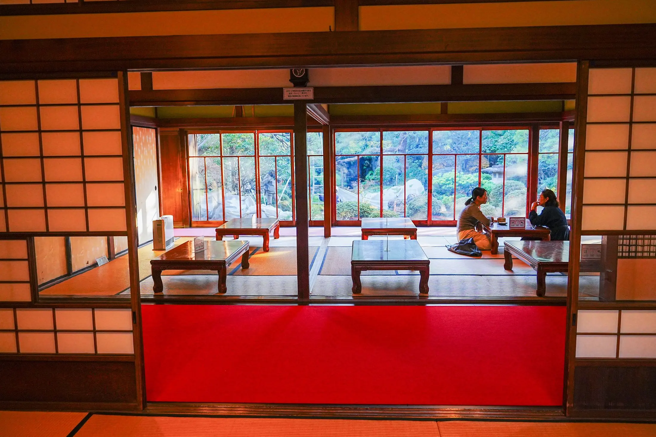 A tatami room at Yamamoto-tei with a red carpet