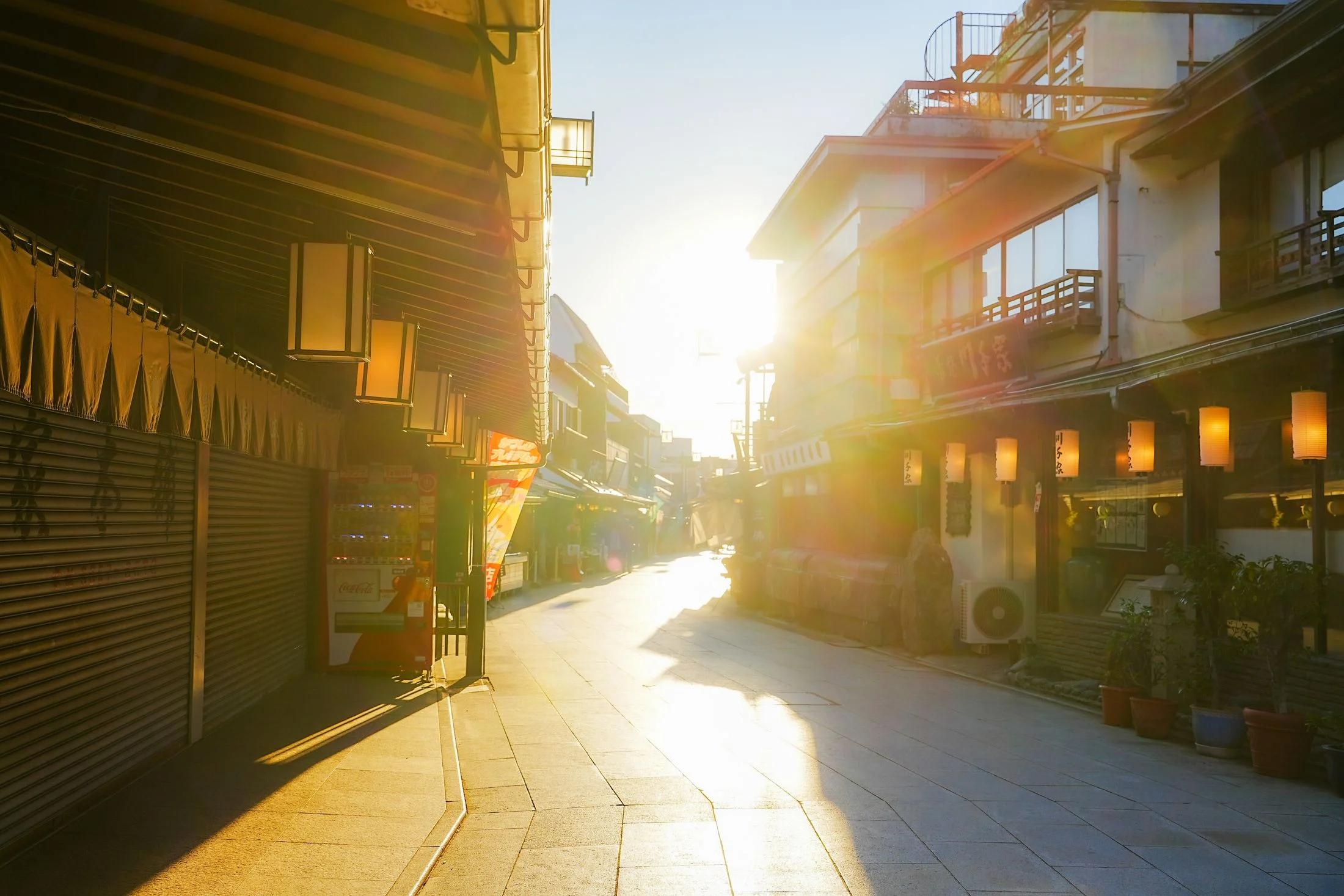 The approach to Shibamata Taishakuten at dusk, lanterns lit